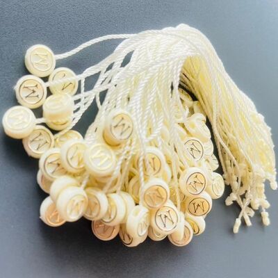 Wipe With A Soft Cloth Plastic Tag Fastener Garment Tagging Custom Rope Length Strong Durable Label Attachment Solution