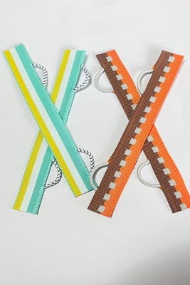 Etichette di abbigliamento tessuto personalizzate Taglio ad ultrasuoni artigianali con fine pieghevole Dettagli di imballaggio 500-1000pcs/sacco o per scatola